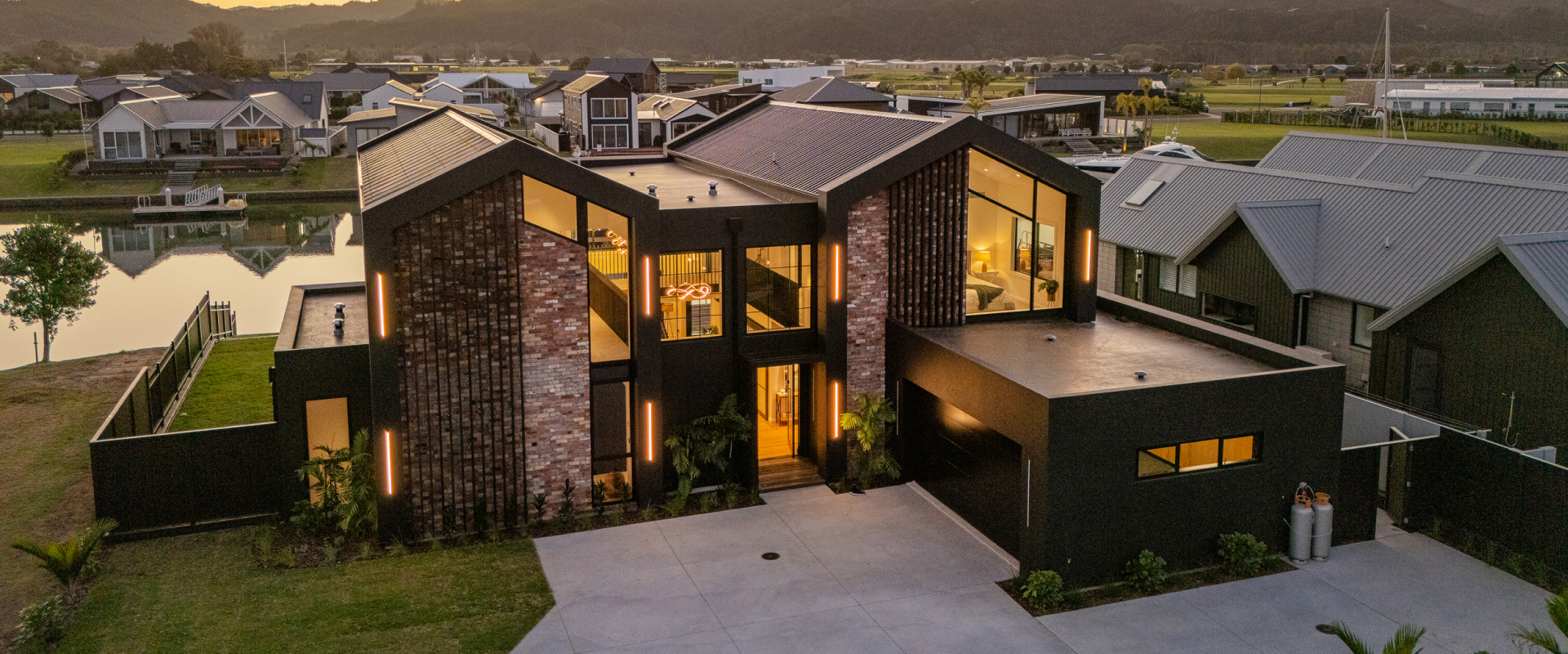 Beautiful new home on the waterways large aluminium windows